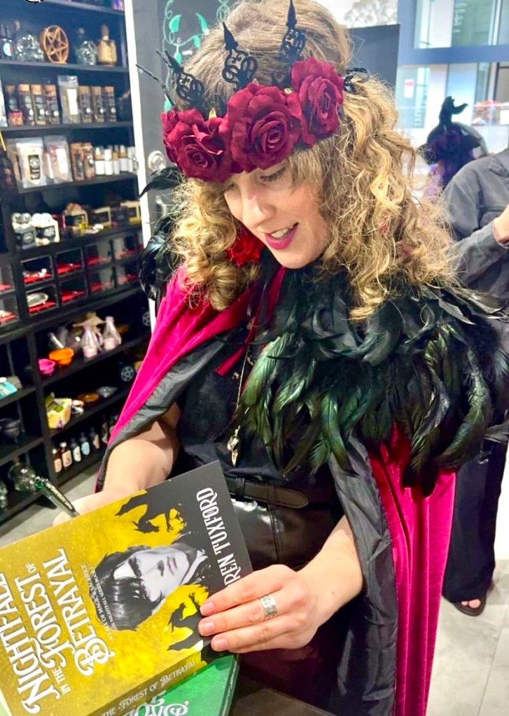 Jess Knaus fantasy and sci-fi author Loren Tuxford signing books